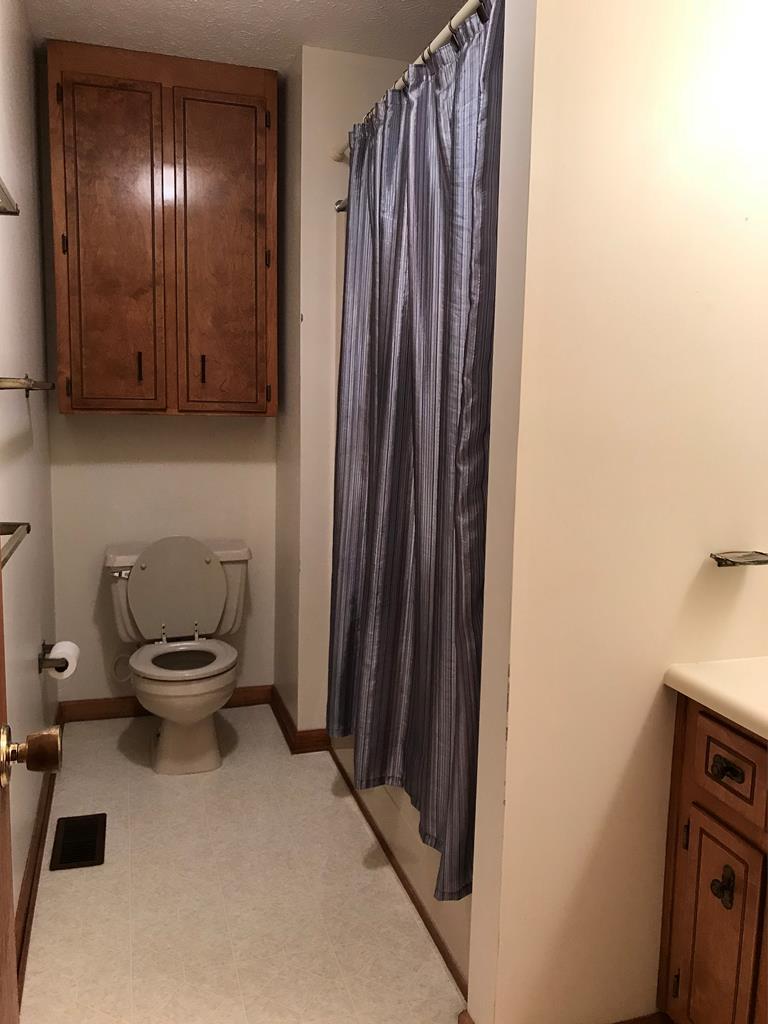 339 Bluegill Road Eatonton, GA 31024 - Photo 16 of 20 a bathroom with a toilet and a sink