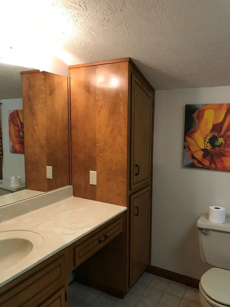 339 Bluegill Road Eatonton, GA 31024 - Photo 20 of 20 a bathroom with a sink and a mirror