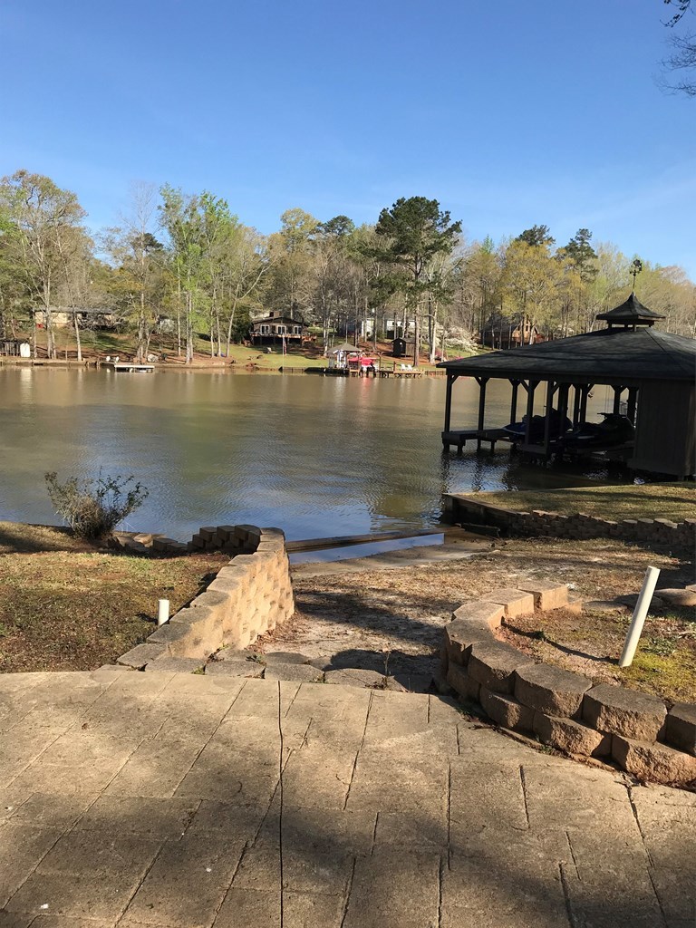 339 Bluegill Road Eatonton, GA 31024 - Photo 3 of 20 a view of a lake with a mountain in the background