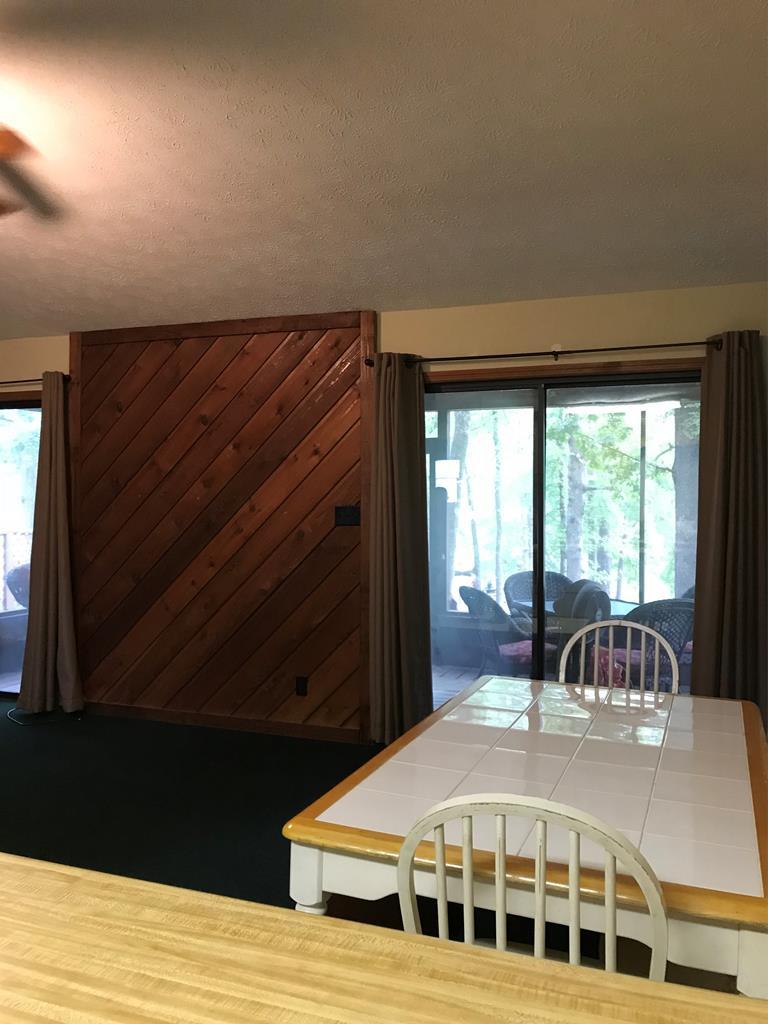 339 Bluegill Road Eatonton, GA 31024 - Photo 9 of 20 a large bed sitting in a bedroom next to a window