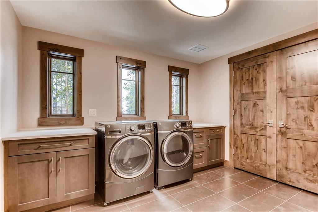 11 Independence Road Keystone, CO 80435 - Photo 19 of 24 a utility room with dryer and washer