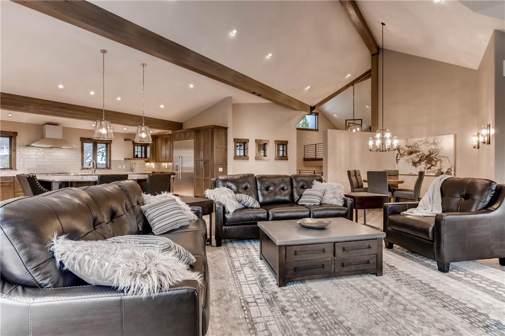 11 Independence Road Keystone, CO 80435 - Photo 3 of 24 a living room with furniture kitchen view and a chandelier
