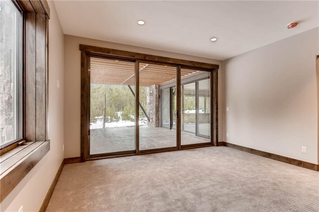 11 Independence Road Keystone, CO 80435 - Photo 21 of 24 an empty room with wooden floor and windows