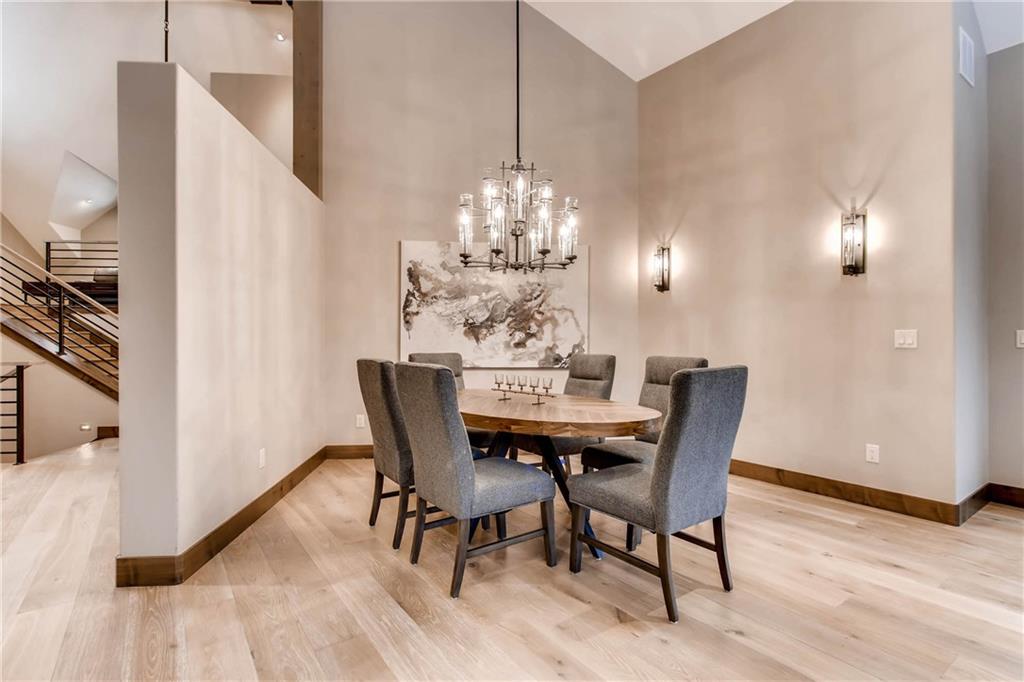 11 Independence Road Keystone, CO 80435 - Photo 8 of 24 a view of a dining room with furniture and wooden floor