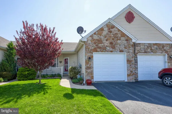 a front view of house with yard