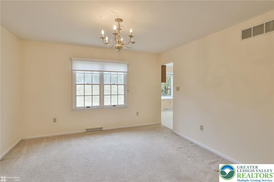4059 Wedgewood Road Allentown, PA 18104 - Photo 11 of 50 wooden floor in an empty room with a window
