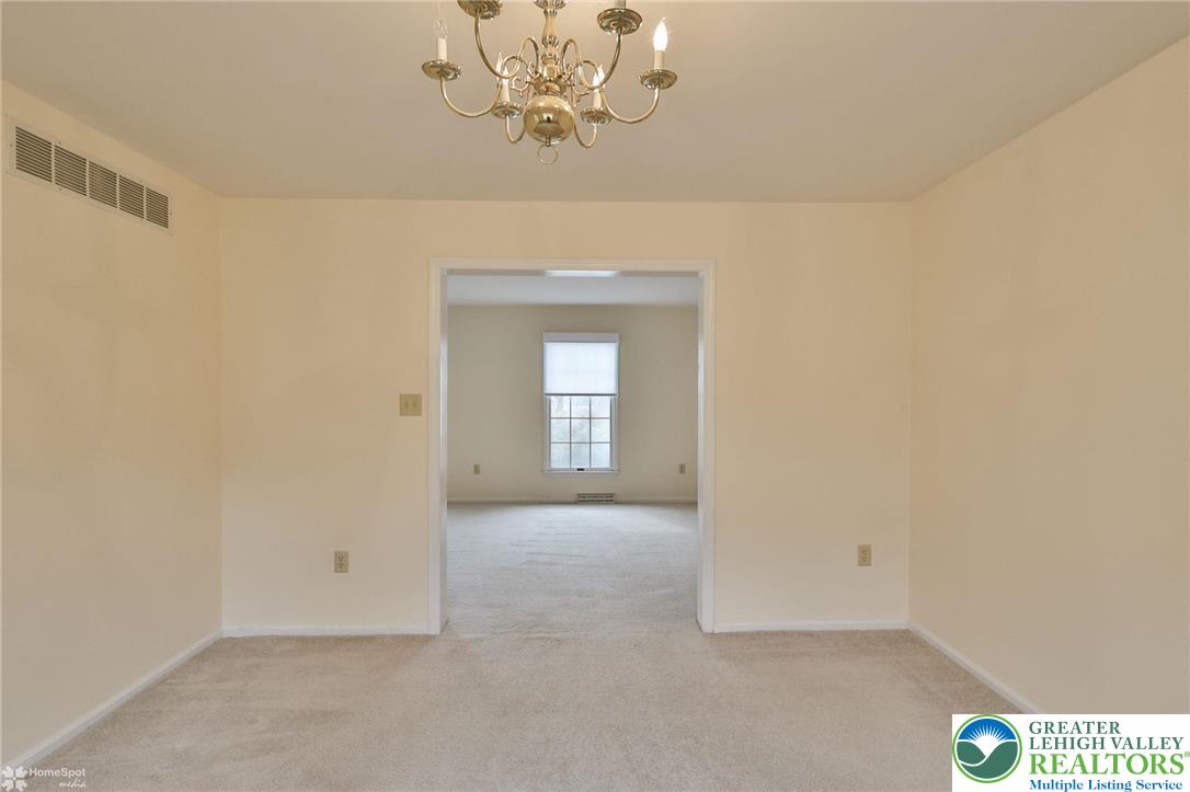 4059 Wedgewood Road Allentown, PA 18104 - Photo 13 of 50 a view of an empty room with a window