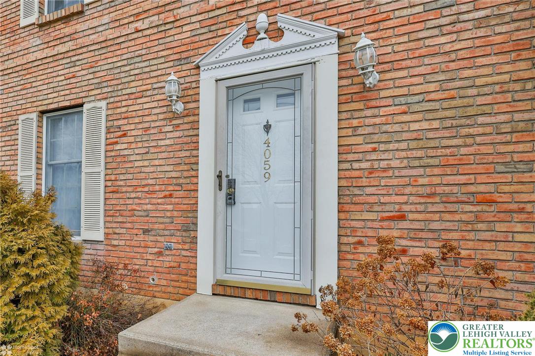 4059 Wedgewood Road Allentown, PA 18104 - Photo 2 of 50 a view of a door and brick walls