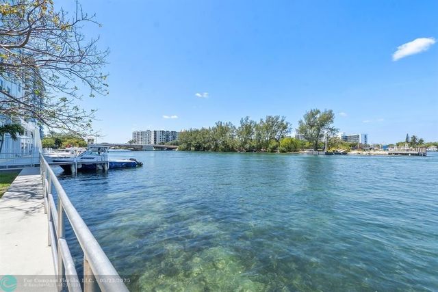a view of a lake from a balcony