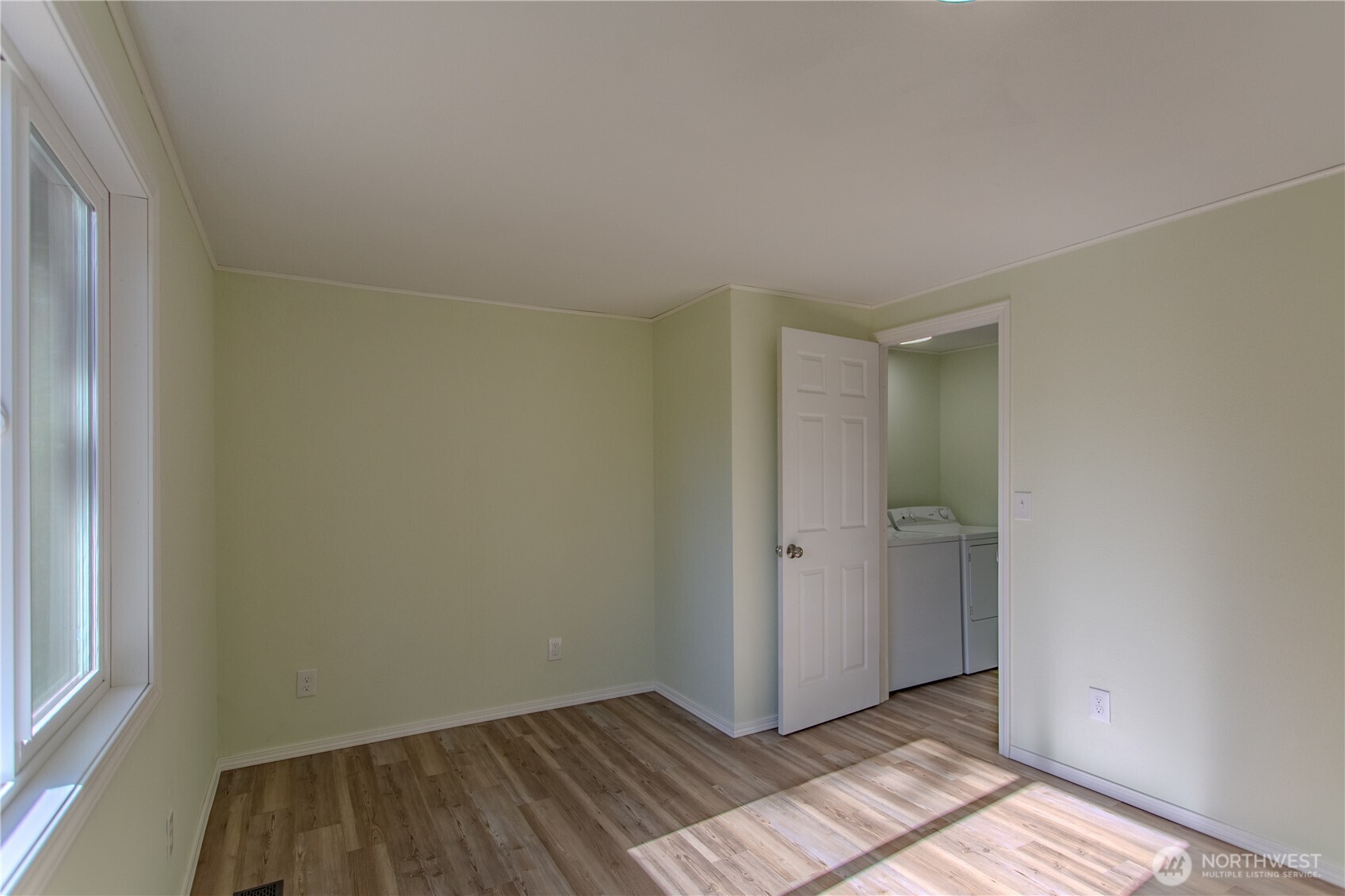 17340 Sargent Road Southwest, Unit 35 Rochester, WA 98579 - Photo 15 of 25 a view of an empty room and window