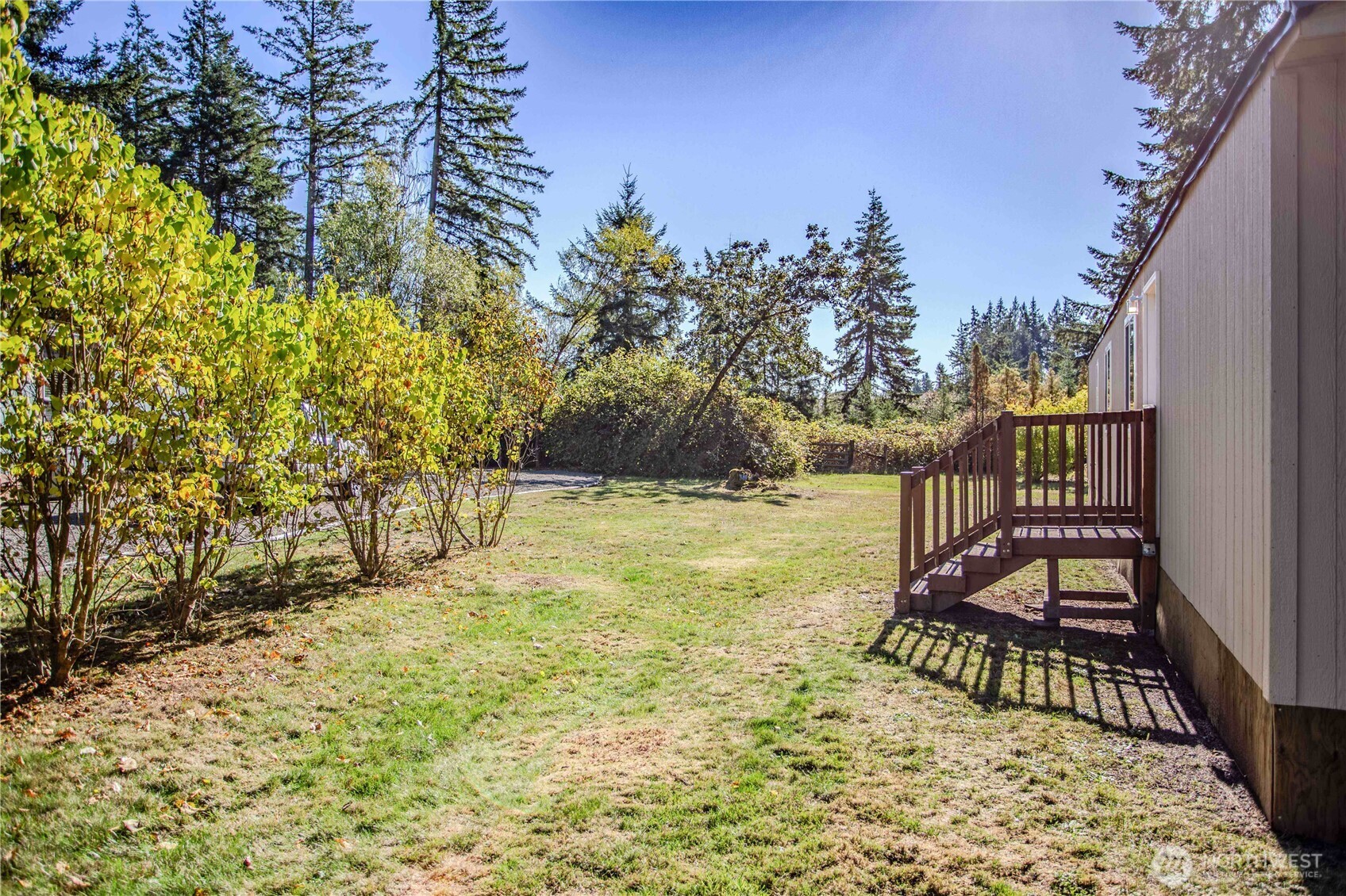 17340 Sargent Road Southwest, Unit 35 Rochester, WA 98579 - Photo 24 of 25 a view of an outdoor space and a yard
