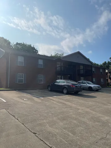 a car parked in front of a house