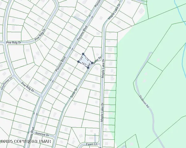 a view of a backyard of the house