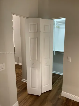 a view of an empty walk in closet