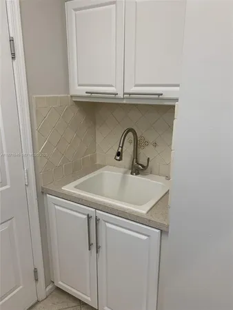 a view of entryway and hall with a window