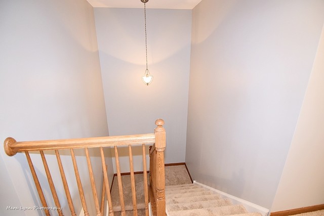 427 Acushnet Street Elgin, IL 60124 - Photo 13 of 26 a view of a hallway with a white cabinet