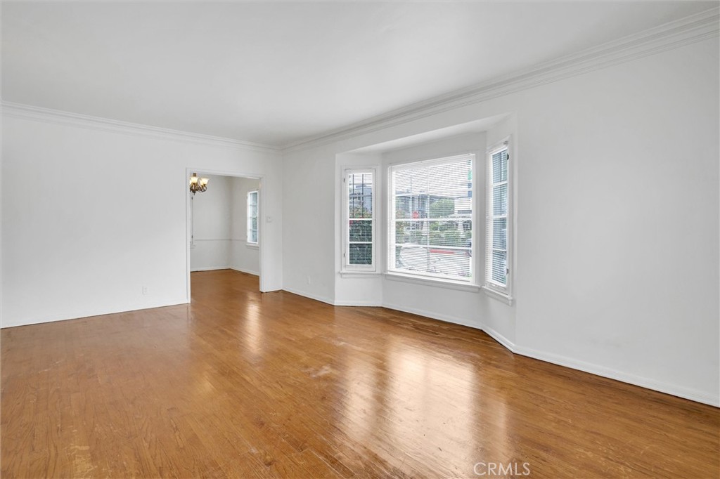 515 Rose Avenue Venice, CA 90291 - Photo 15 of 49 wooden floor in an empty room with a window