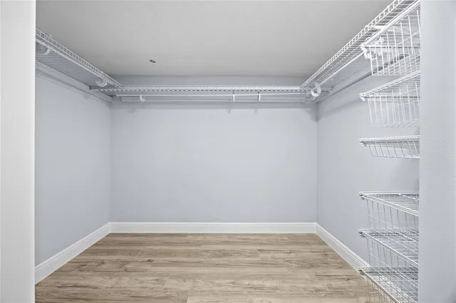 a view of a room with racks on the wall
