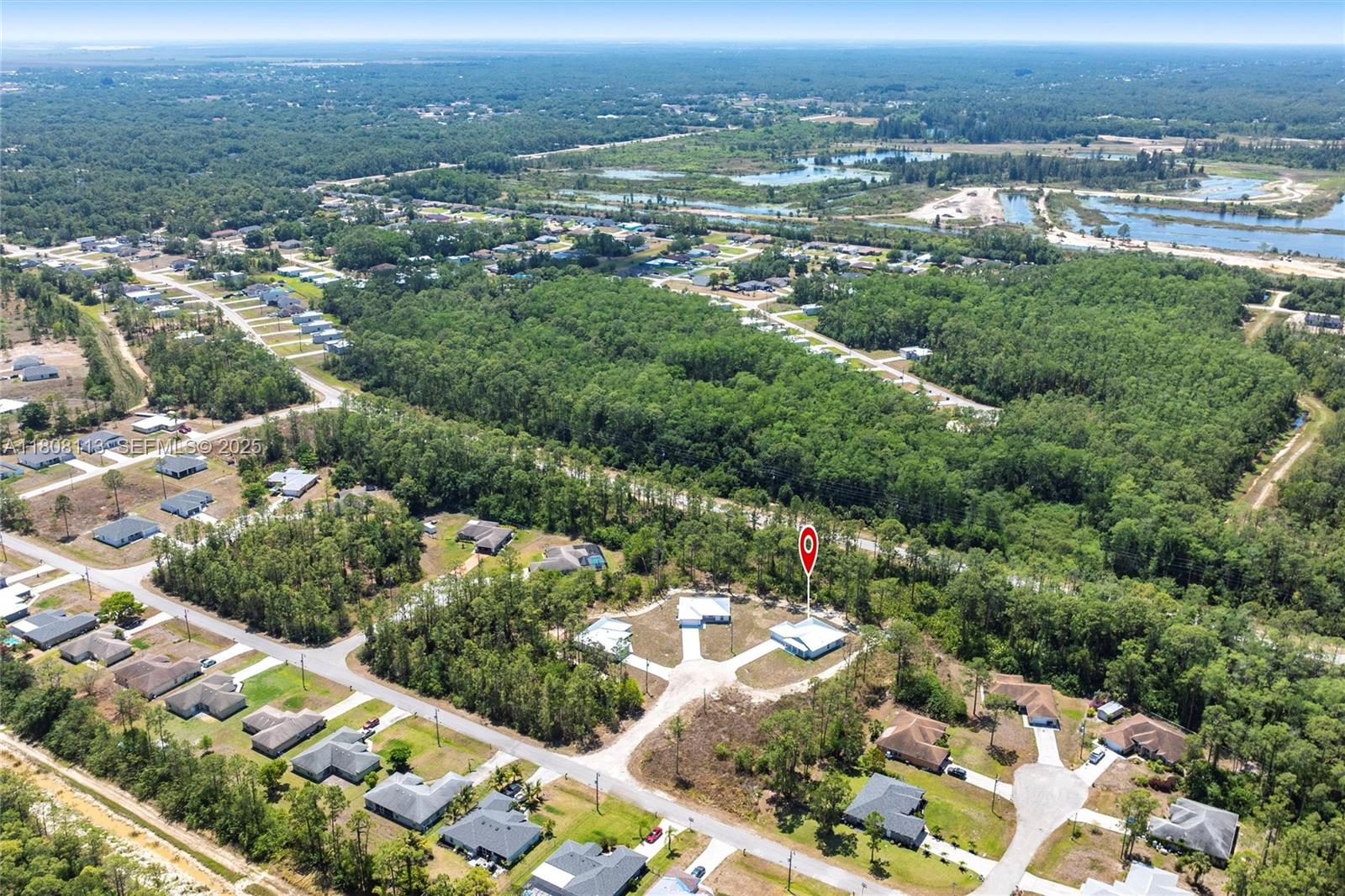 2006 Rosa Court, Unit 2006 Lehigh Acres, FL 33972 - Photo 21 of 22 an aerial view of a city