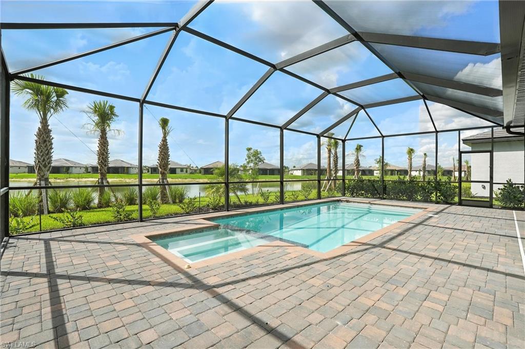 19105 Hinkley Drive Estero, FL 33928 - Photo 37 of 48 View from above of property featuring a pool