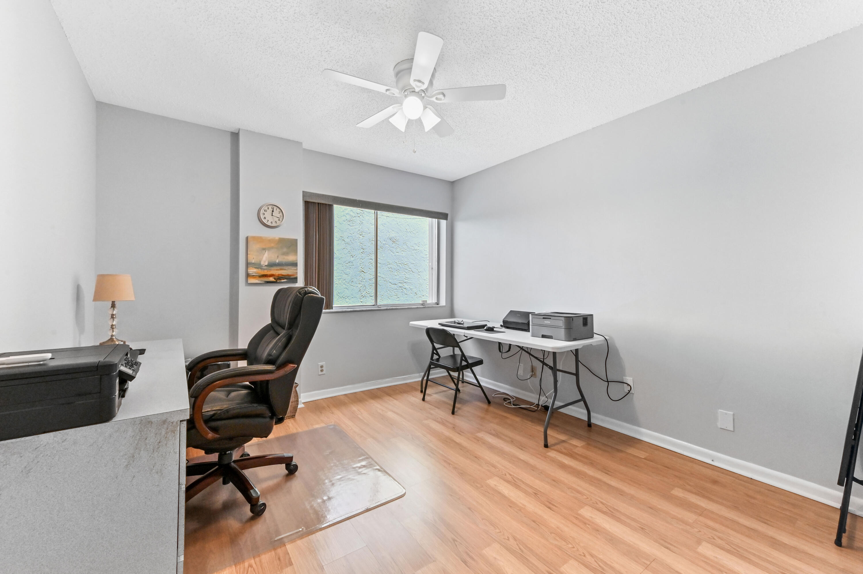 6768 10th Avenue North, Unit 316 Lake Worth, FL 33467 - Photo 16 of 38 a work room with furniture and a window