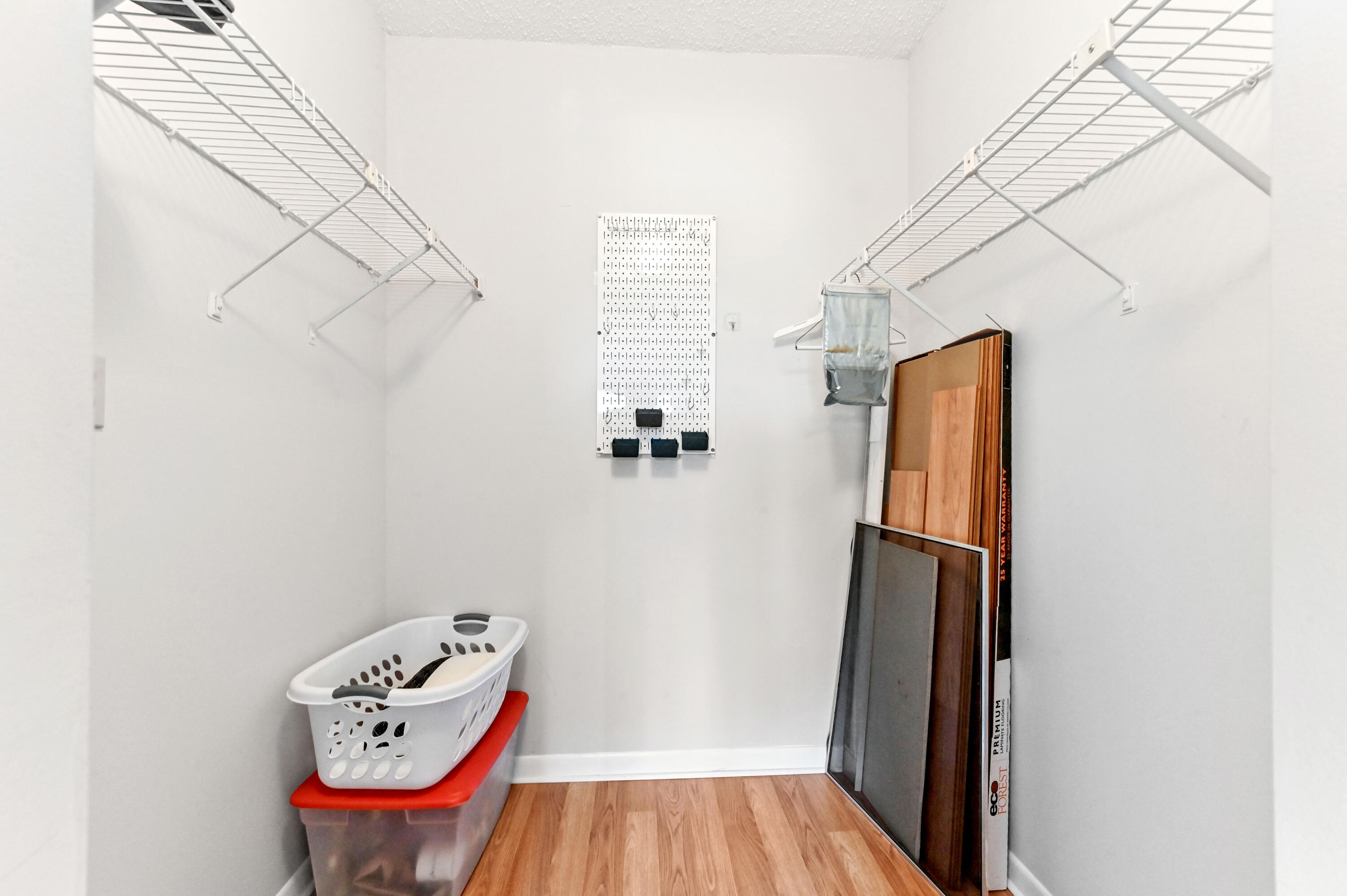 6768 10th Avenue North, Unit 316 Lake Worth, FL 33467 - Photo 20 of 38 a bathroom with a toilet and a mirror