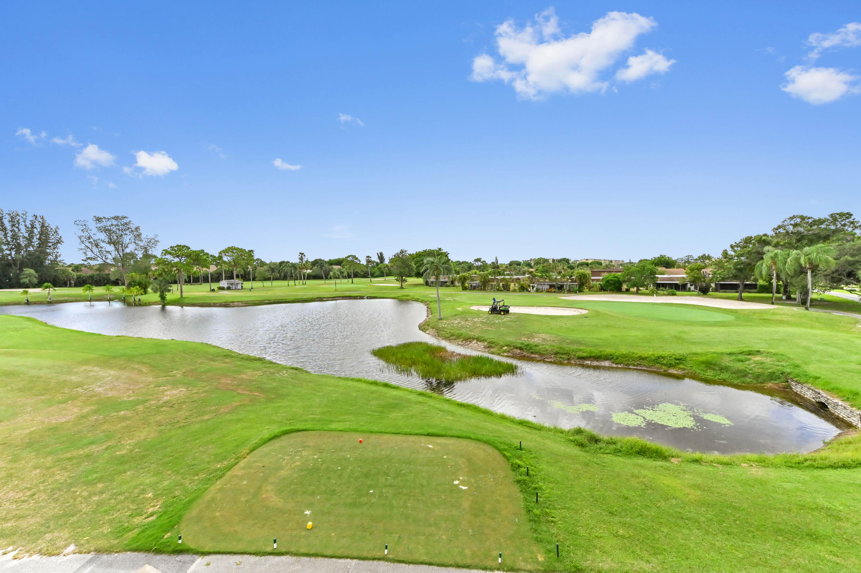 6768 10th Avenue North, Unit 316 Lake Worth, FL 33467 - Photo 31 of 38 a view of a lake with a big yard