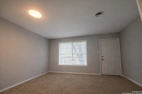 an empty room with a window