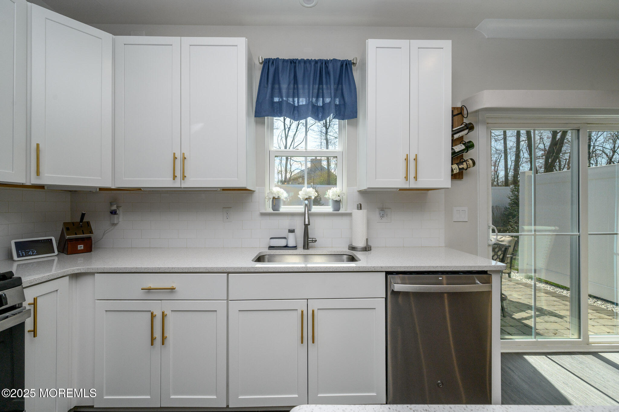 48 Athens Way Cliffwood, NJ 07721 - Photo 11 of 39 a kitchen with white cabinets and window