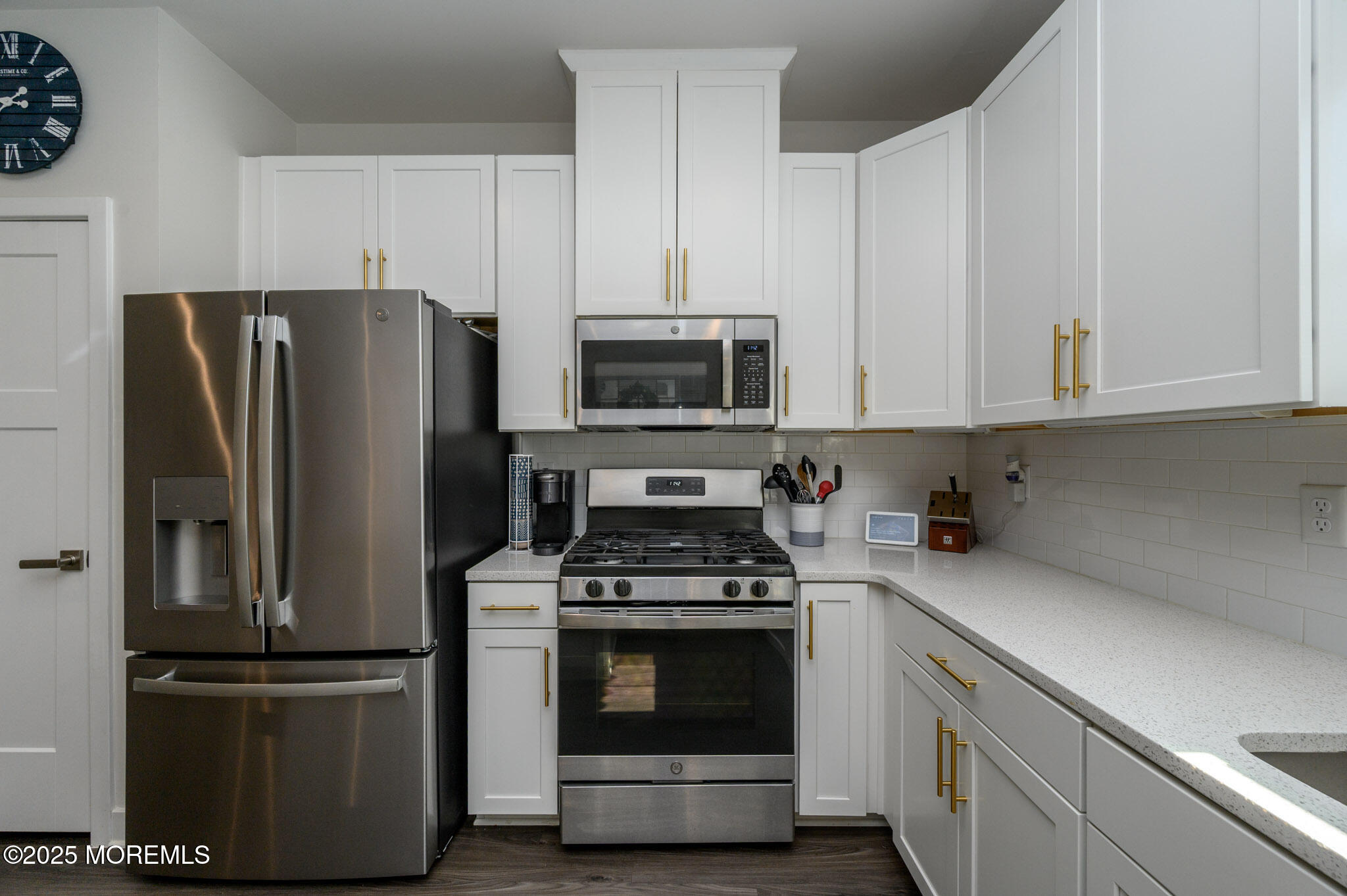 48 Athens Way Cliffwood, NJ 07721 - Photo 12 of 39 a kitchen with cabinets stainless steel appliances and a counter space