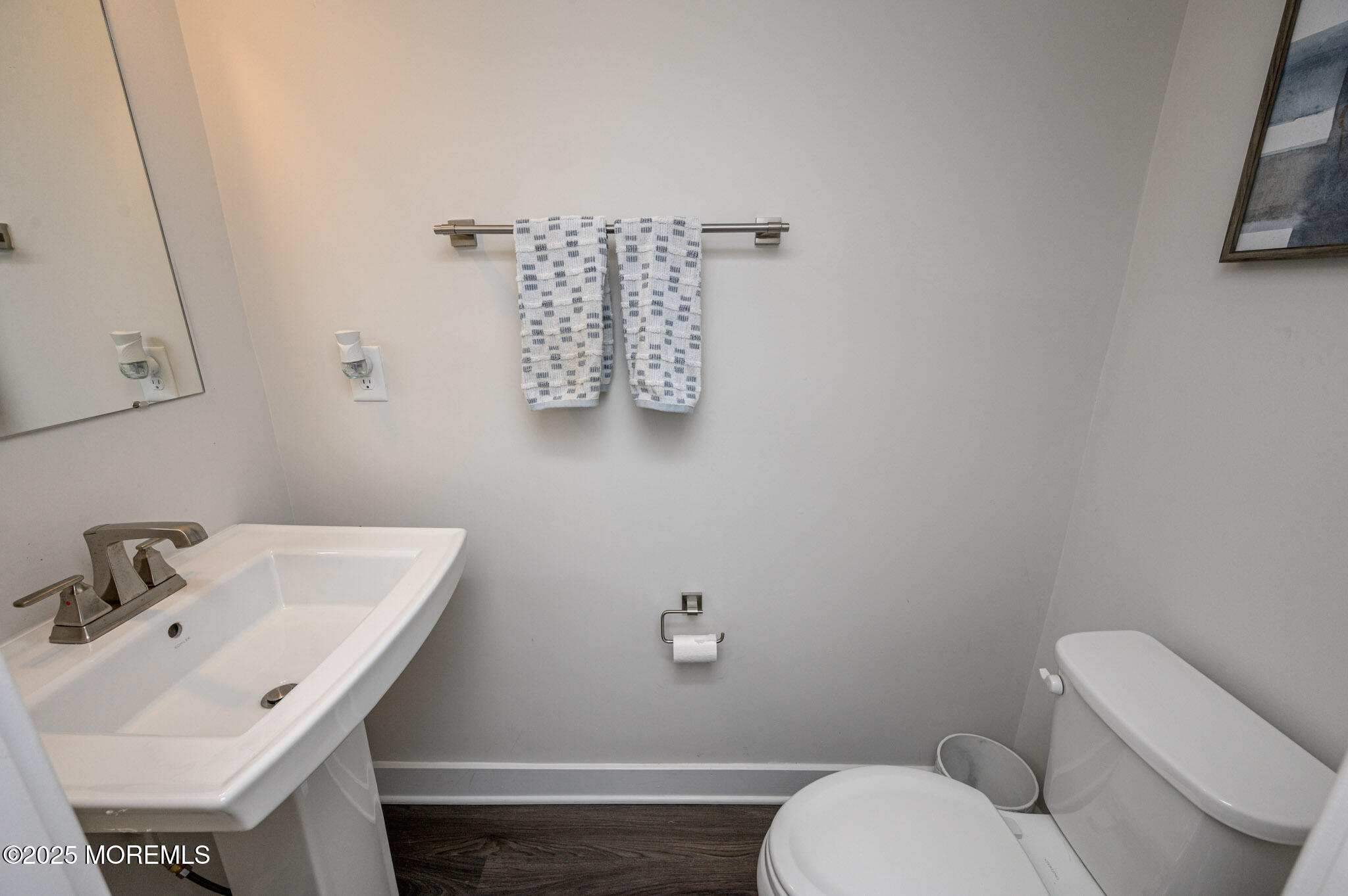 48 Athens Way Cliffwood, NJ 07721 - Photo 13 of 39 a bathroom with a toilet sink and mirror