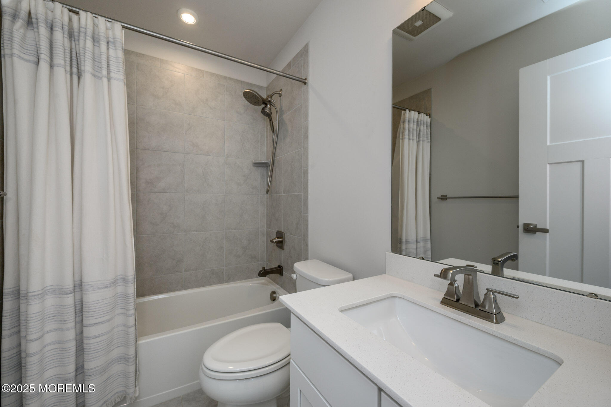 48 Athens Way Cliffwood, NJ 07721 - Photo 16 of 39 a bathroom with a sink toilet and shower