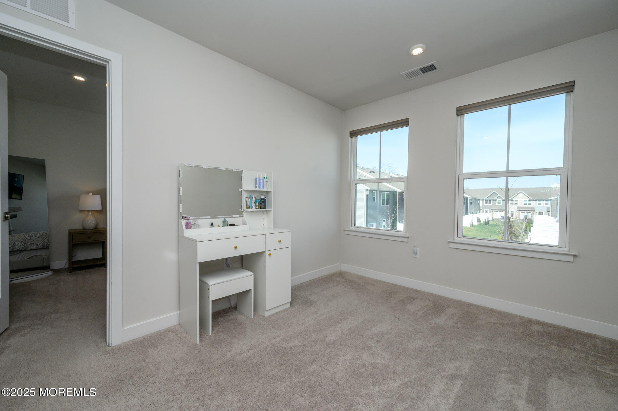 48 Athens Way Cliffwood, NJ 07721 - Photo 19 of 39 a bathroom with a sink vanity and a mirror