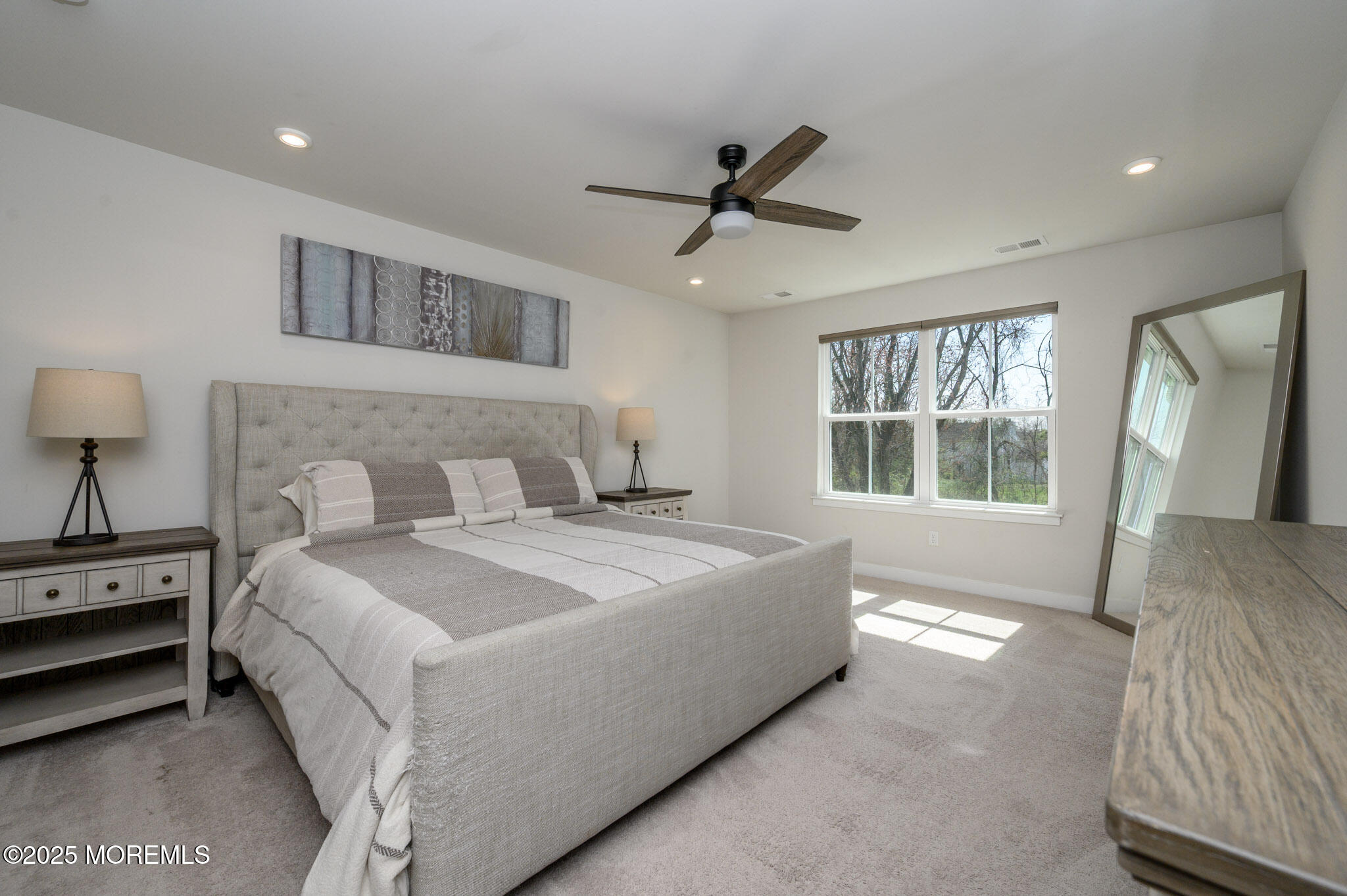 48 Athens Way Cliffwood, NJ 07721 - Photo 21 of 39 a spacious bedroom with a bed and a window