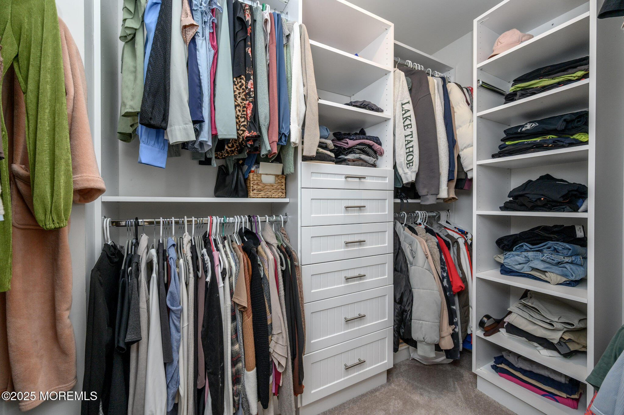48 Athens Way Cliffwood, NJ 07721 - Photo 24 of 39 a view of walk in closet with clothes and shoes