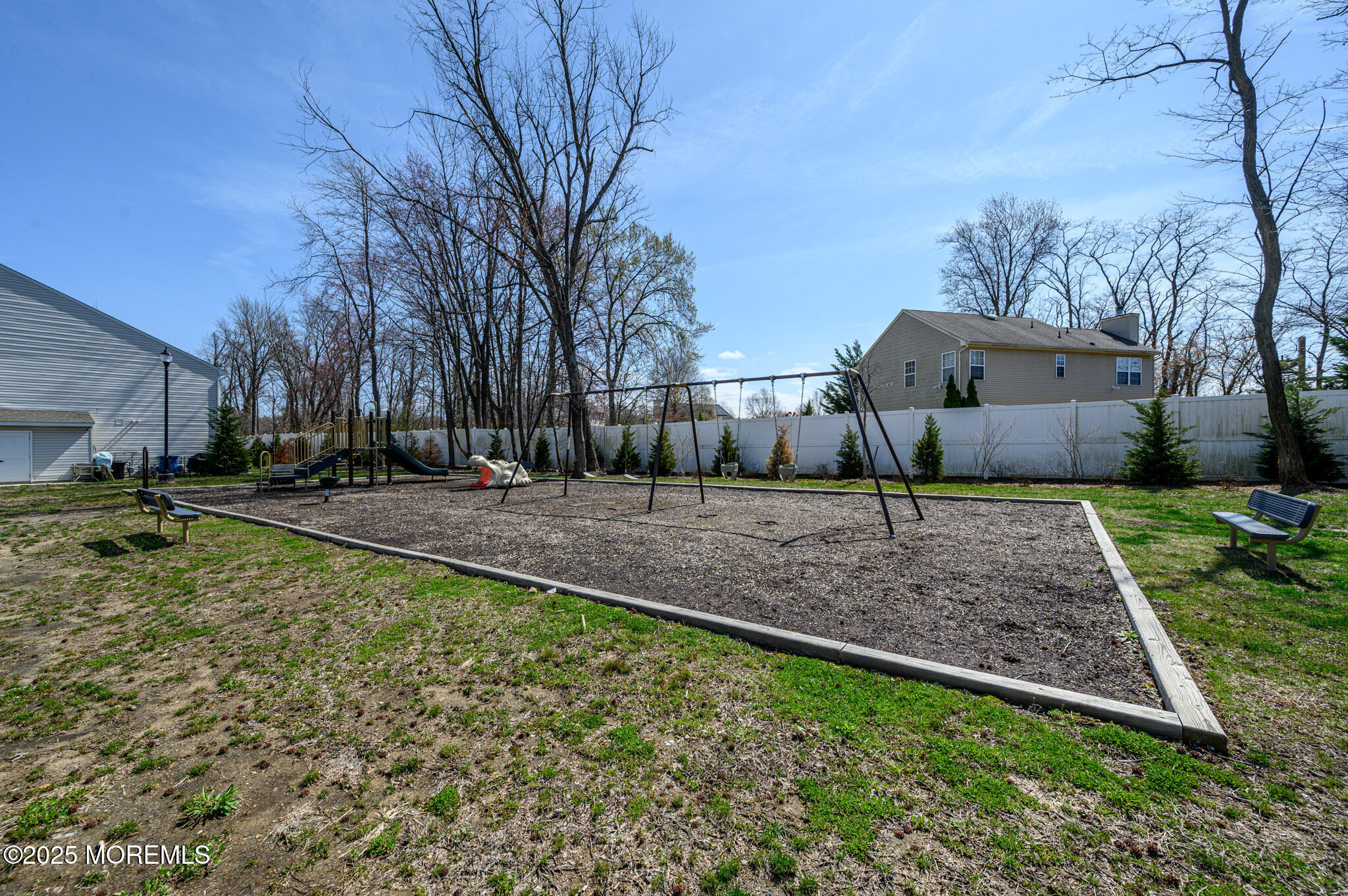 48 Athens Way Cliffwood, NJ 07721 - Photo 32 of 39 a view of a yard with a house and tree s