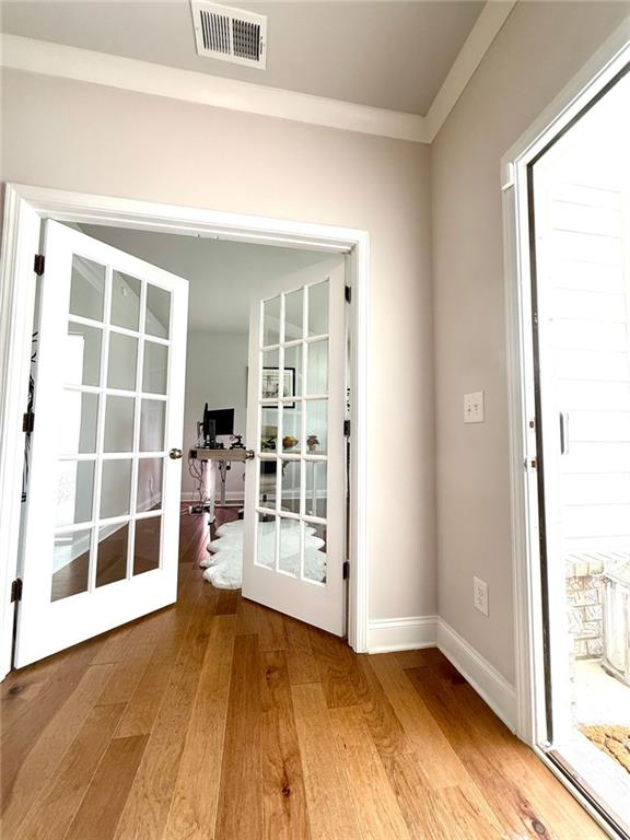 26 Riverclub Road Acworth, GA 30101 - Photo 13 of 73 an empty room with wooden floor and windows