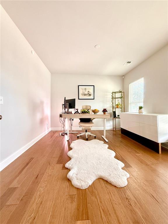 26 Riverclub Road Acworth, GA 30101 - Photo 15 of 73 a living room with furniture and a wooden floor