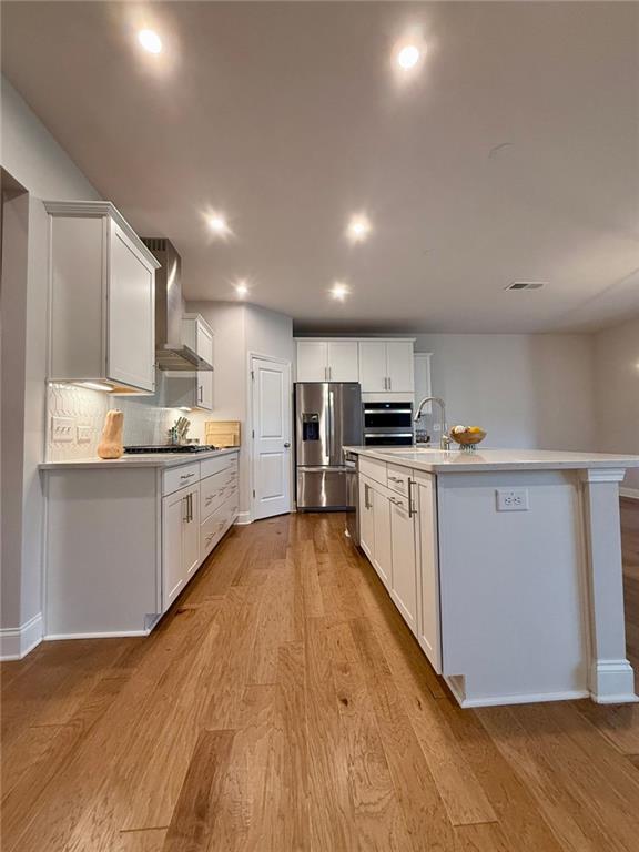 26 Riverclub Road Acworth, GA 30101 - Photo 25 of 73 a large kitchen with stainless steel appliances lots of counter space and a sink