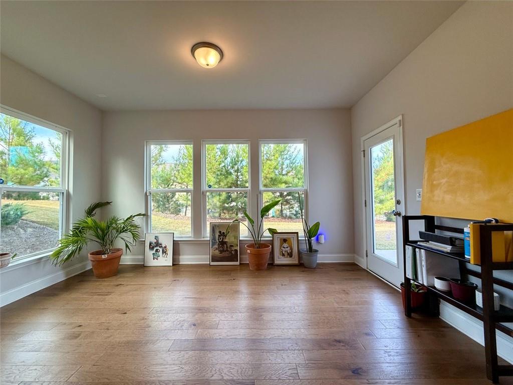 26 Riverclub Road Acworth, GA 30101 - Photo 37 of 73 a living room with furniture and large windows