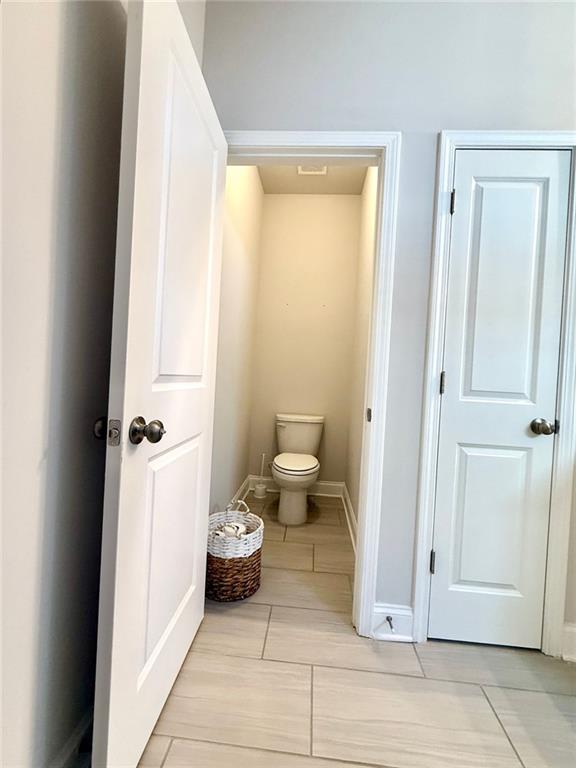 26 Riverclub Road Acworth, GA 30101 - Photo 52 of 73 a bathroom with a toilet