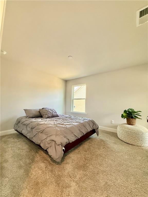 26 Riverclub Road Acworth, GA 30101 - Photo 61 of 73 a bedroom with a bed and window