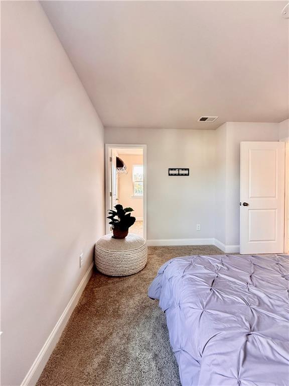 26 Riverclub Road Acworth, GA 30101 - Photo 64 of 73 a bedroom with a bed and window