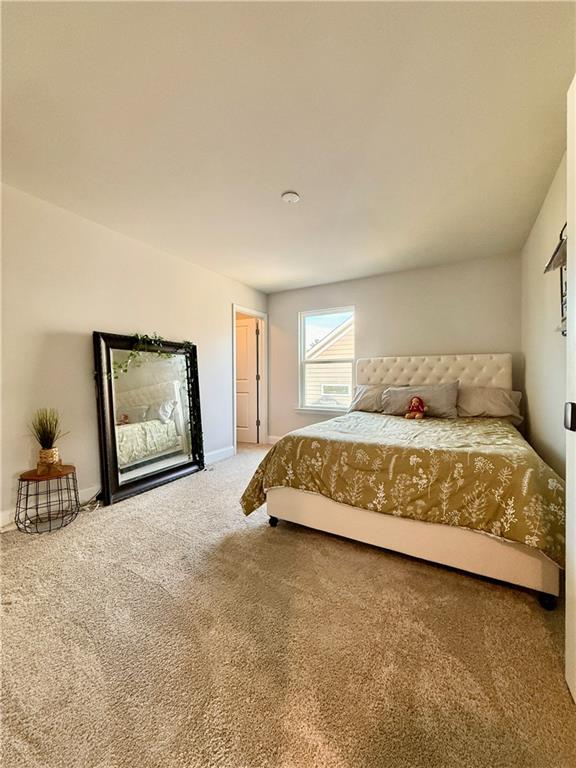 26 Riverclub Road Acworth, GA 30101 - Photo 68 of 73 a bedroom with a bed and window