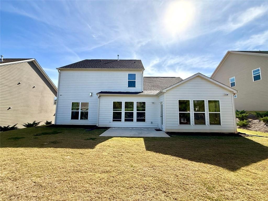 26 Riverclub Road Acworth, GA 30101 - Photo 7 of 73 a front view of a house with a yard
