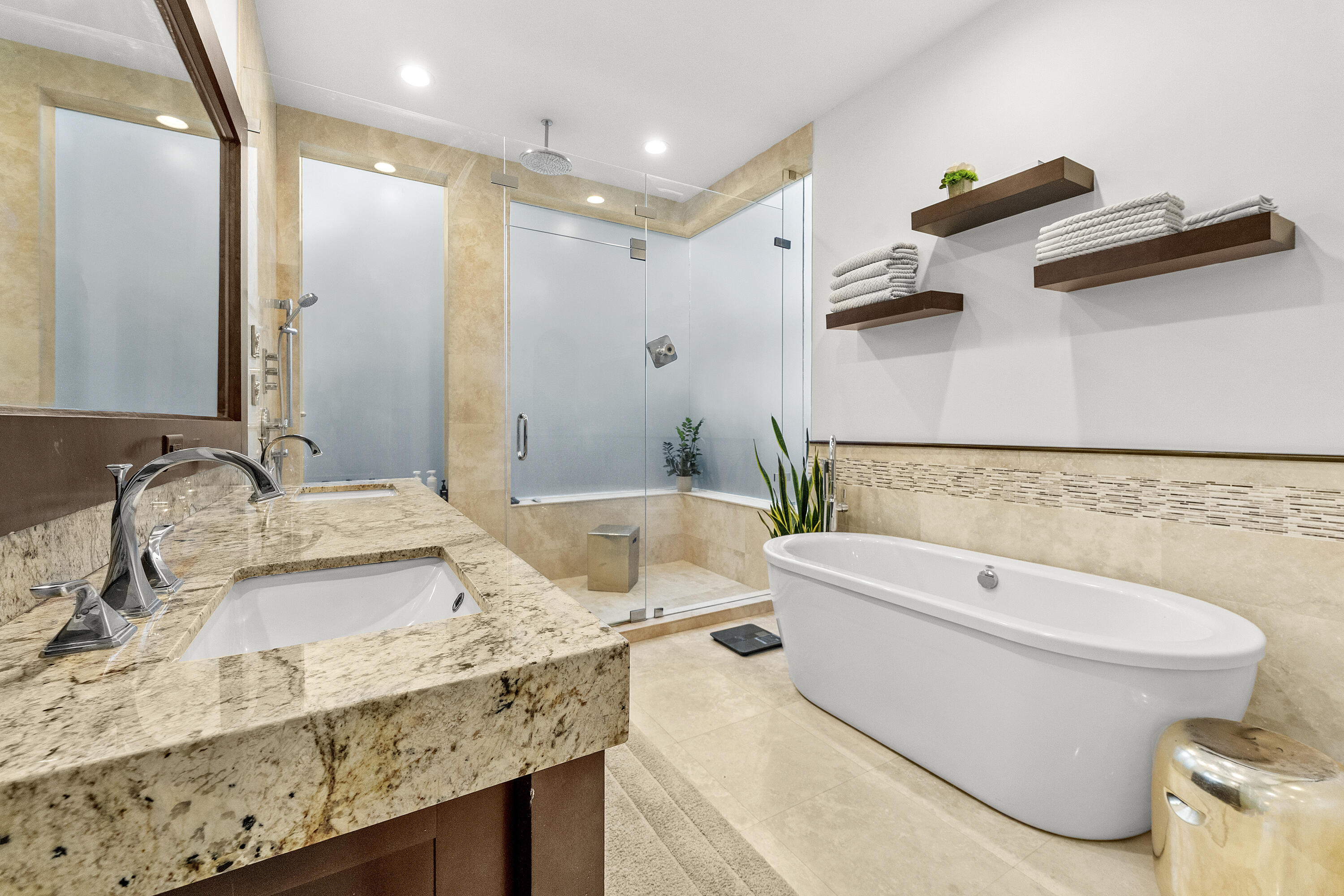 3156 Northwest 61st Street Boca Raton, FL 33496 - Photo 12 of 46 a bathroom with a granite countertop sink and a mirror