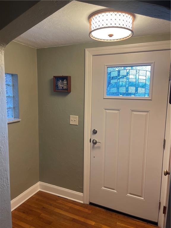 1815 Sample Road Allison Park, PA 15101 - Photo 12 of 40 an empty room with wooden floor and windows