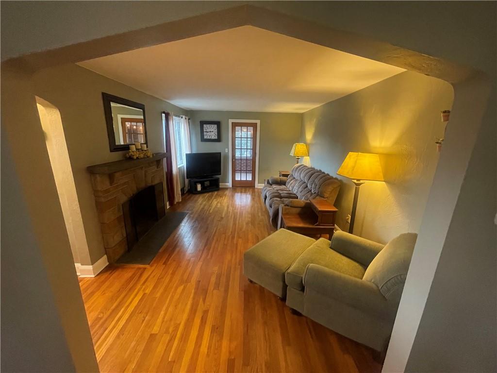 1815 Sample Road Allison Park, PA 15101 - Photo 13 of 40 a living room with furniture and a wooden floor