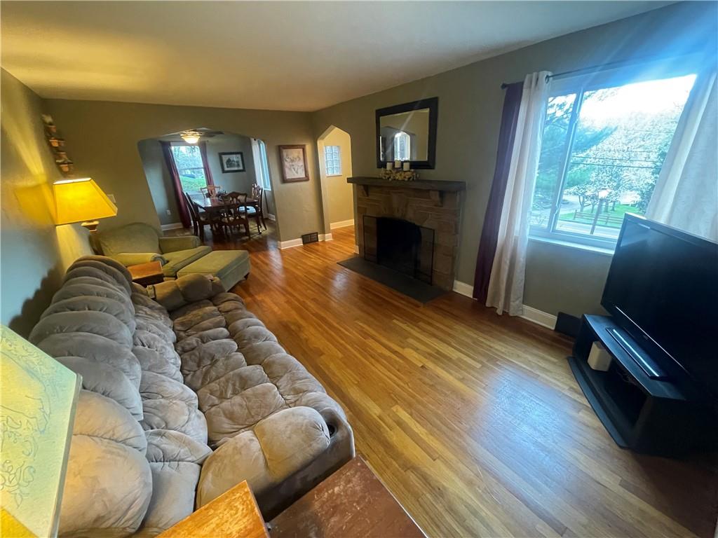 1815 Sample Road Allison Park, PA 15101 - Photo 14 of 40 a living room with furniture and a fireplace