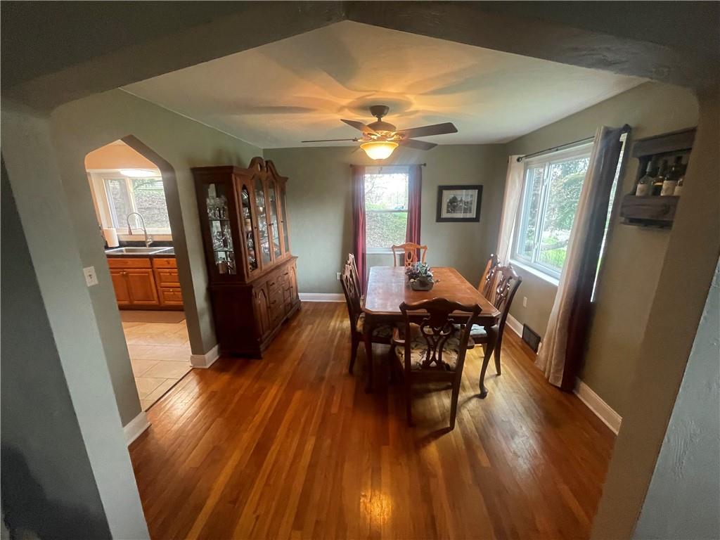 1815 Sample Road Allison Park, PA 15101 - Photo 16 of 40 a view of a dining room with furniture and wooden floor